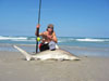 Josh Emerson with a blacktip shark caught during the 2008 Blacktip Challenge shark fishing tournament in Florida