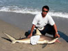 Jimmy Hancock with a blacktip shark caught during the 2009 Blacktip Challenge shark fishing tournament in Florida