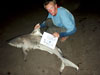 Brian Brazaitis with a blacktip shark caught during the 2011 Blacktip Challenge shark fishing tournament in Florida