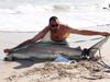 Pete Barrett with a blacktip shark caught during the 2012 Blacktip Challenge shark fishing tournament in Florida